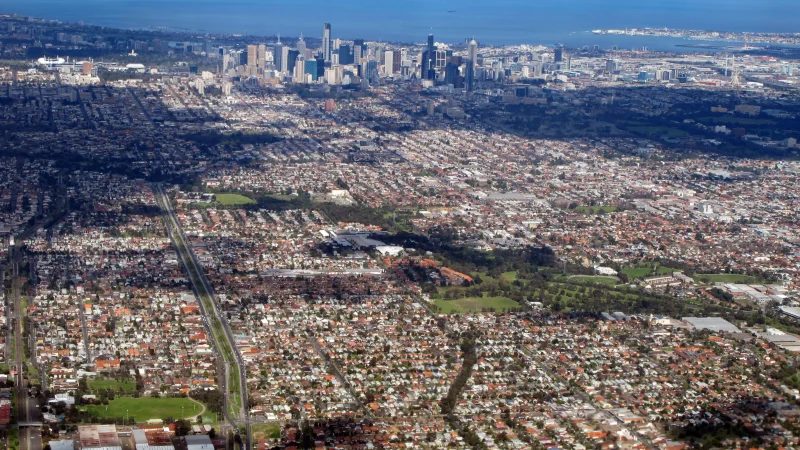 Aerial view of Melbourne's suburbs spreading outwards